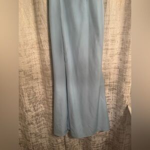 Bariano bridesmaid dress. Maxi dress in color baby blue with one shoulder ruffle